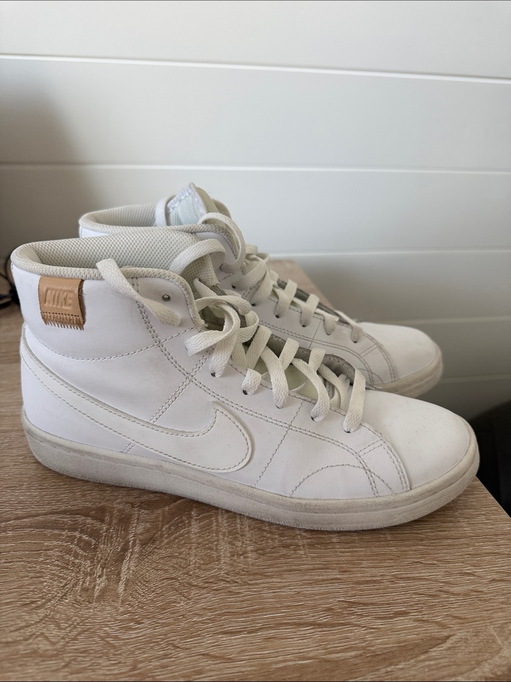 Nike White High-Top Sneakers with Tan Heel Patch